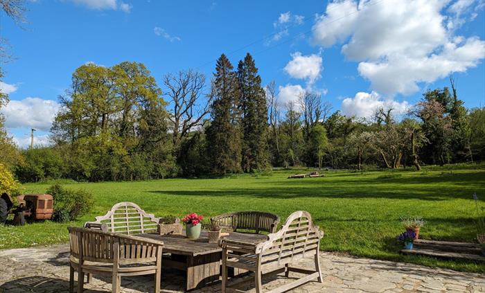 Walk from the dining room, through the french doors, to our patio area, and sit back and relax after a delicious meal. With plenty of spacious grounds